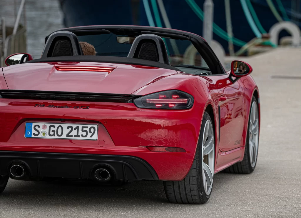 Red Sports Car Black Wheel Rear View
