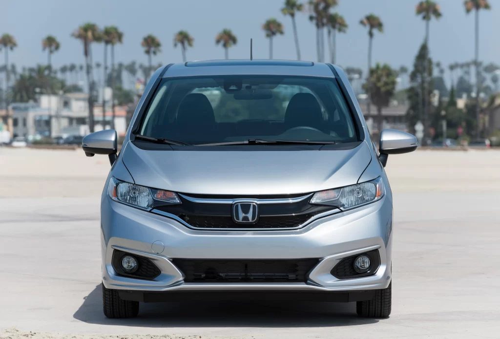 Silver Honda Hatchback Beach Front View