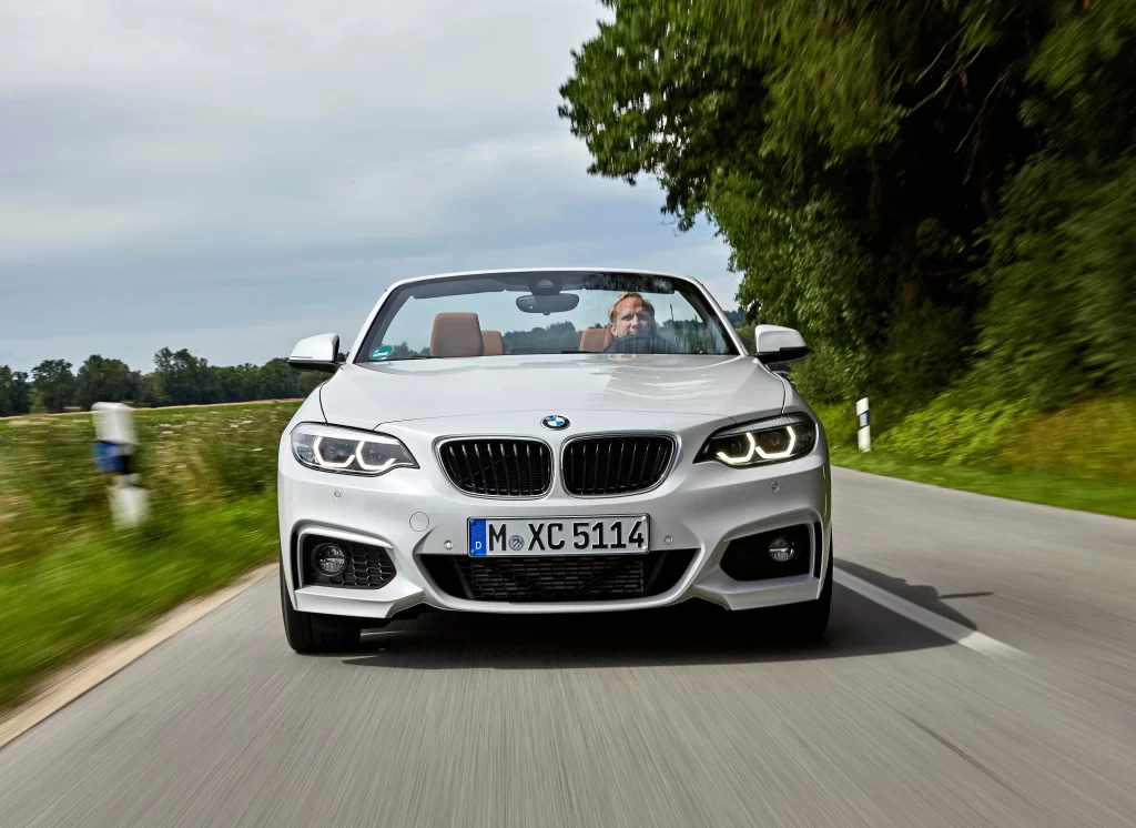 White BMW Convertible Front Motion View