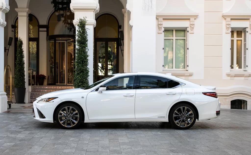 White Lexus Sedan City Street Side View