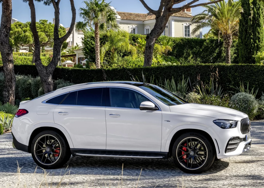 White Mercedes SUV Coastal Side View