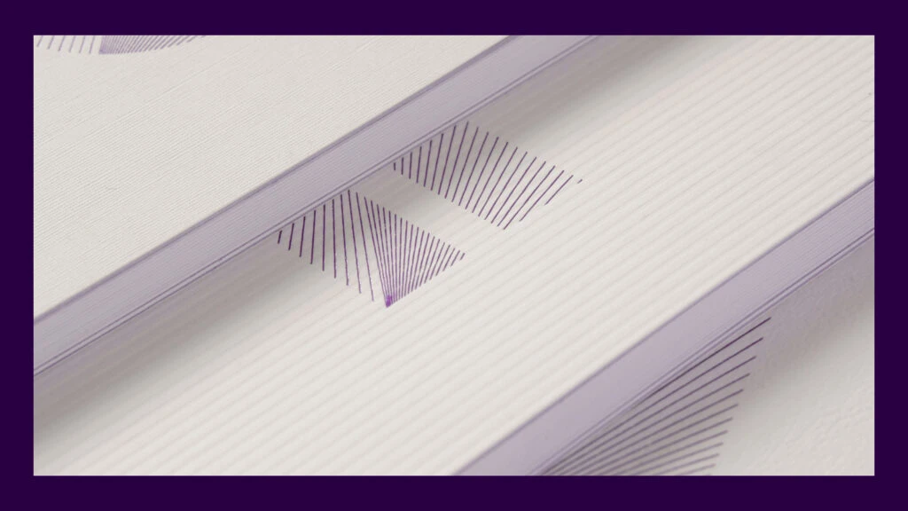 White Notebook With Purple Accents And Geometric Patterns Label