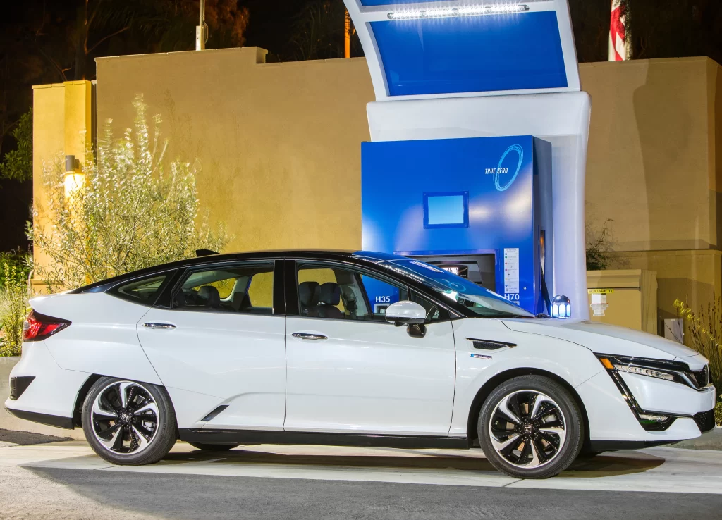 White Plug-In Hybrid Sedan Side View