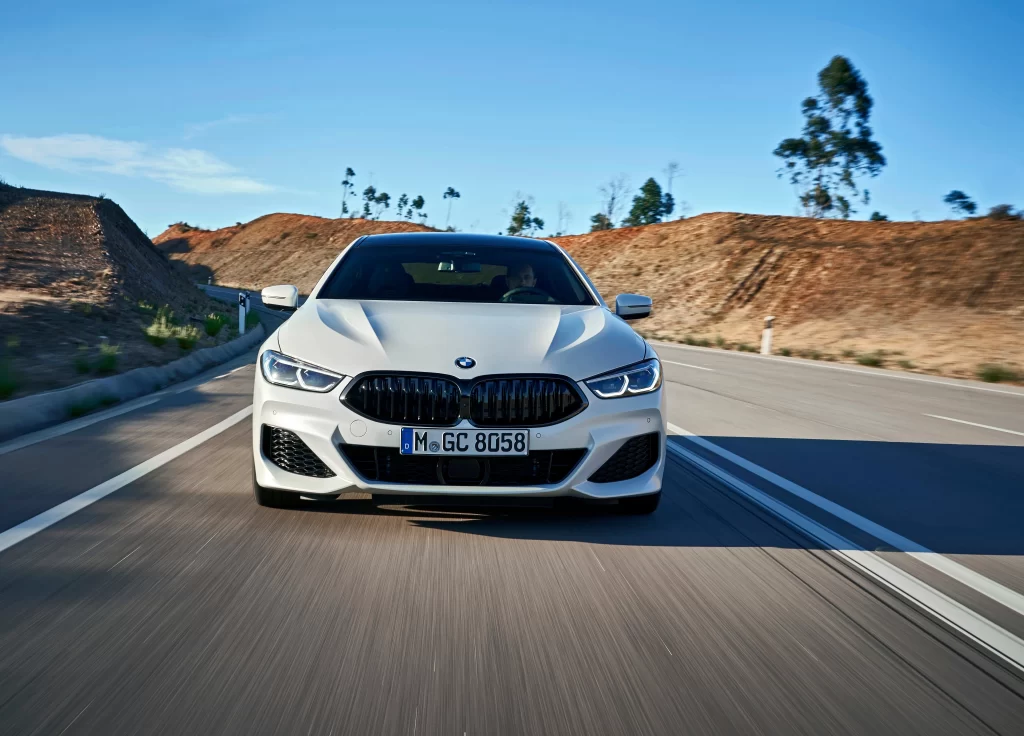 White BMW Sedan Road Motion View