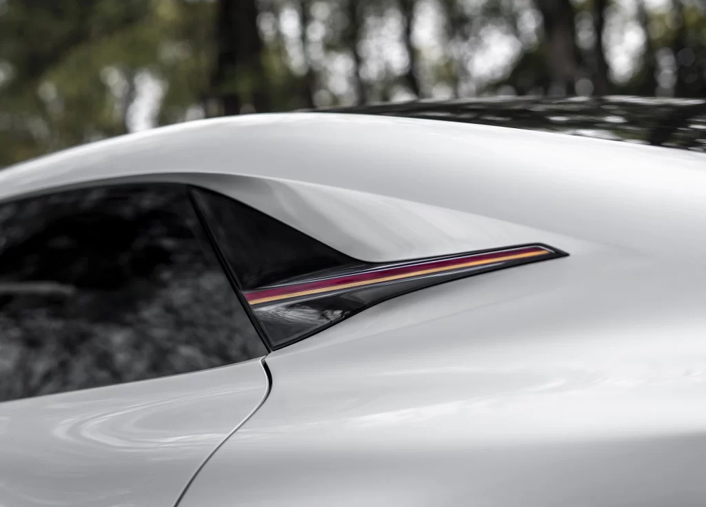 White Sleek Sedan Studio Side View