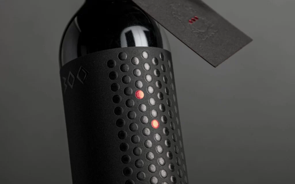 Wine With Perforated Sleeve Bottle