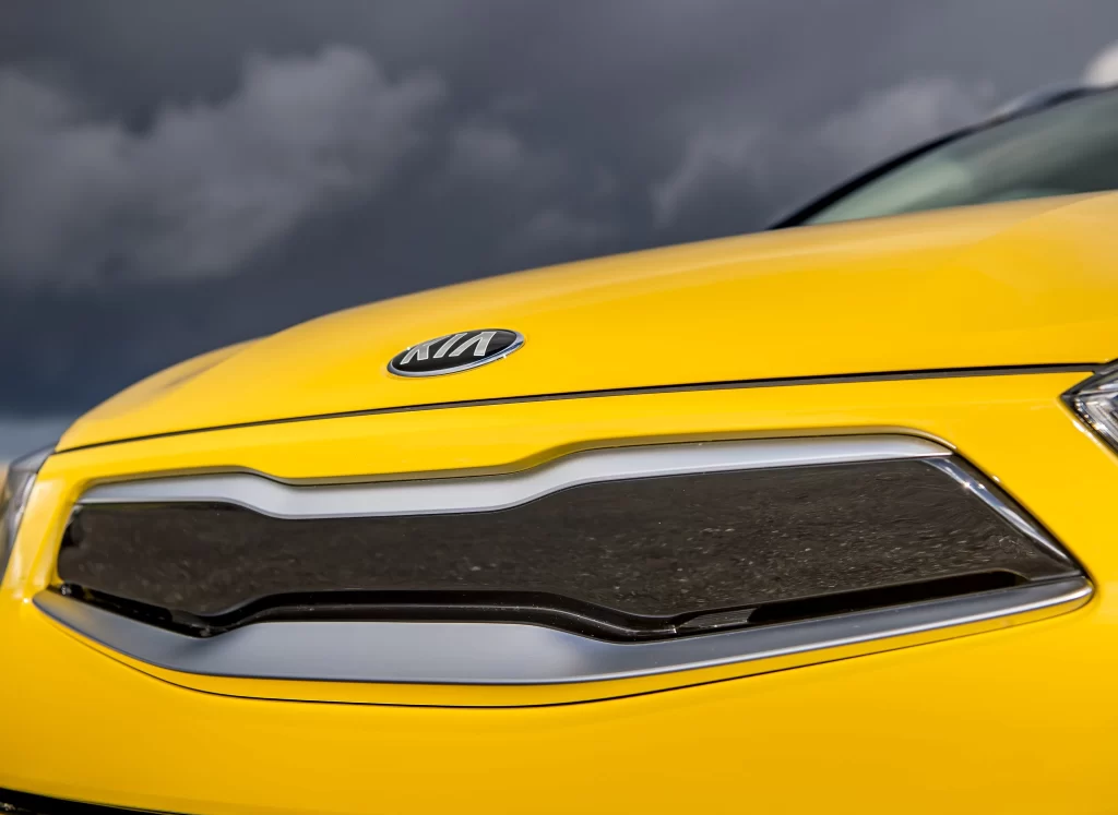 Yellow Kia Front Grille View