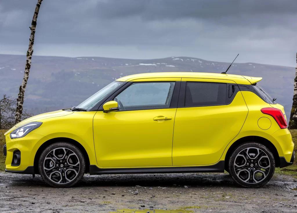 Yellow Suzuki Swift Side View