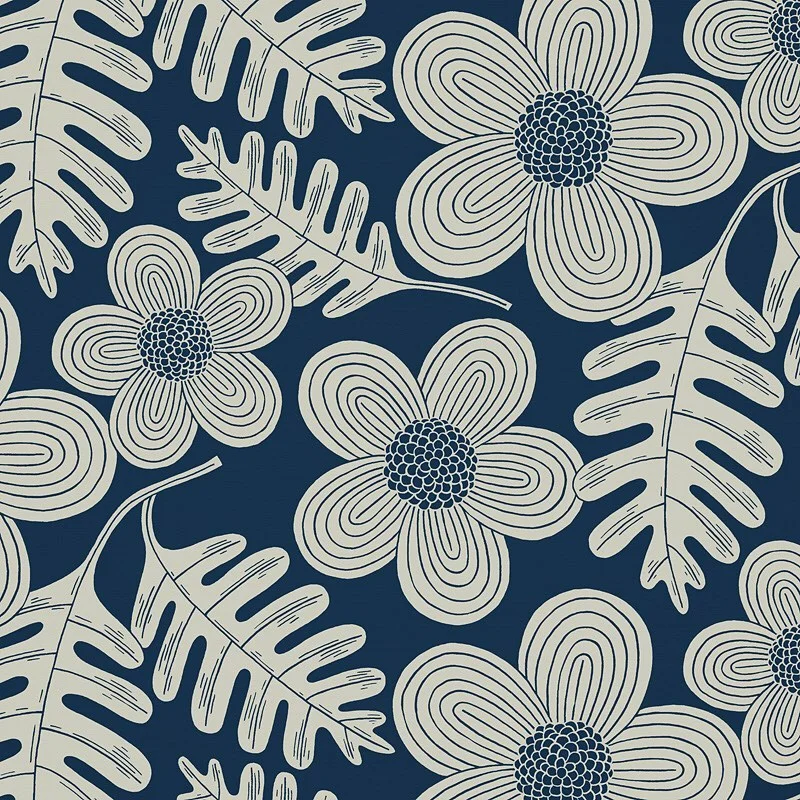 Nancy Wolff Navy blue background with white stylized flowers and leaves