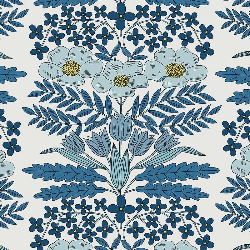 Nancy Wolff Blue floral and leafy pattern on a light background