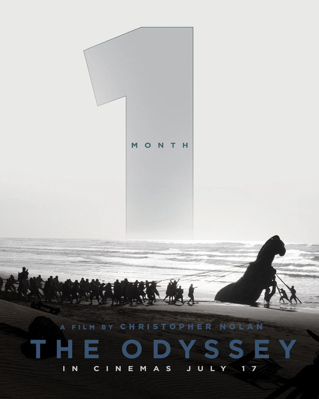 The Odyssey poster with 1 MONTH countdown over grayscale beach scene