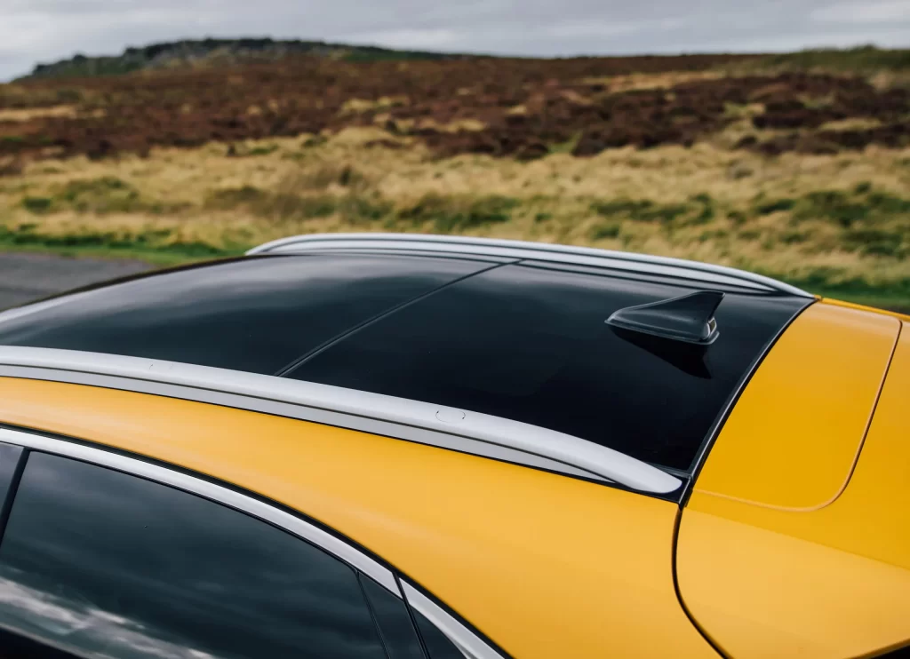 Yellow Car Black Roof Silver Rails Car Photography